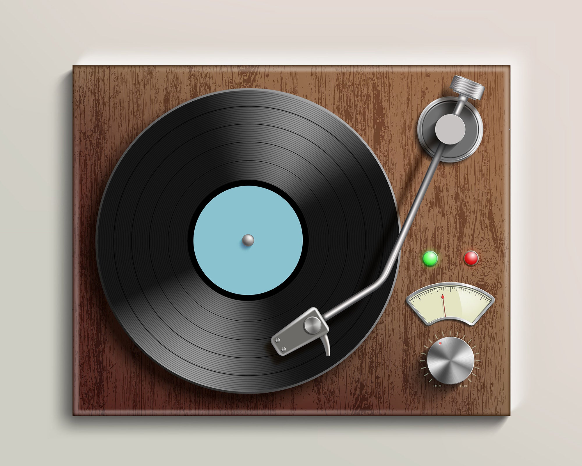 Vintage turntable with a vinyl record on a wood surface