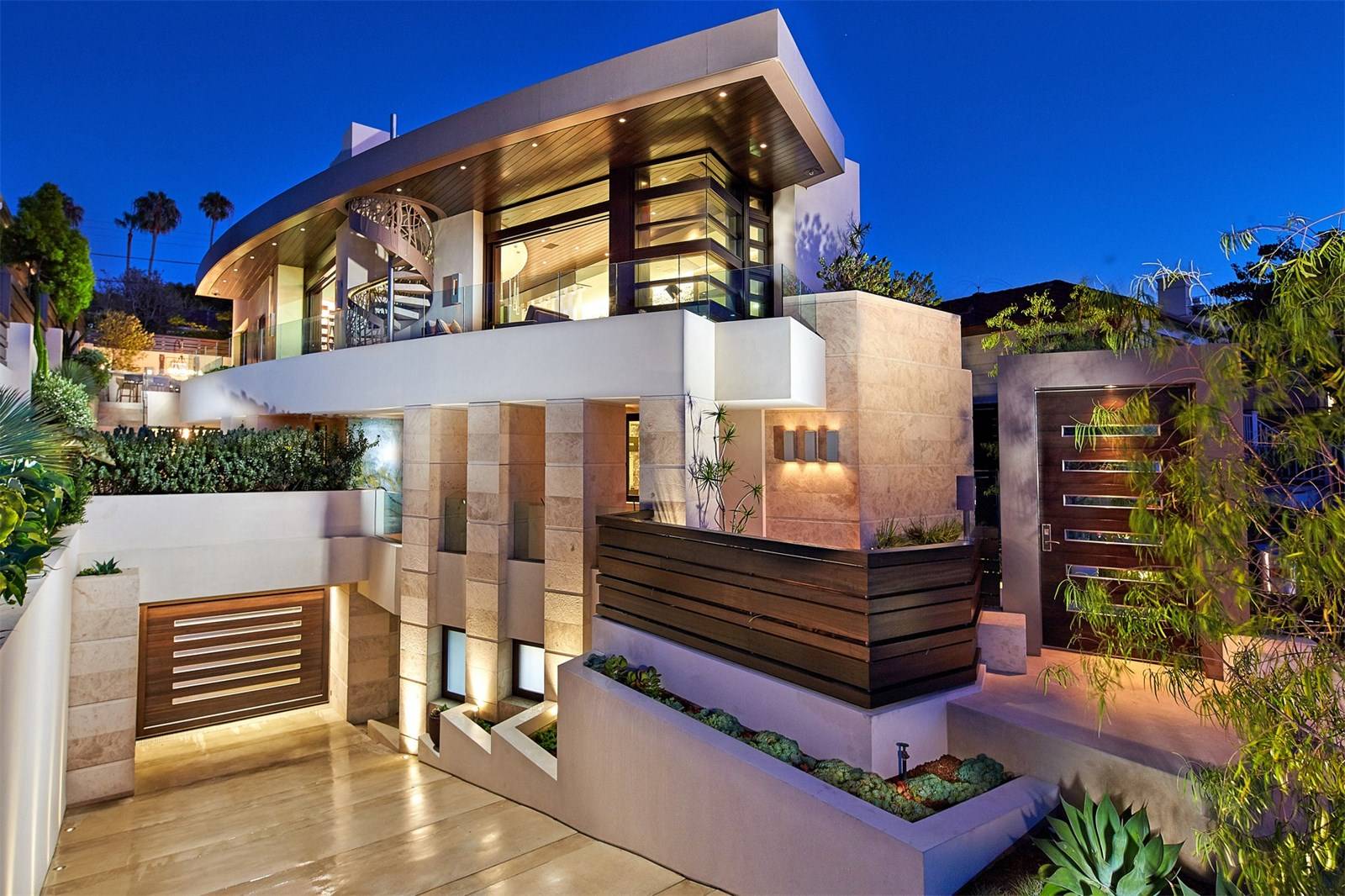Skyline Curve Residence exterior with curved architecture and warm lighting