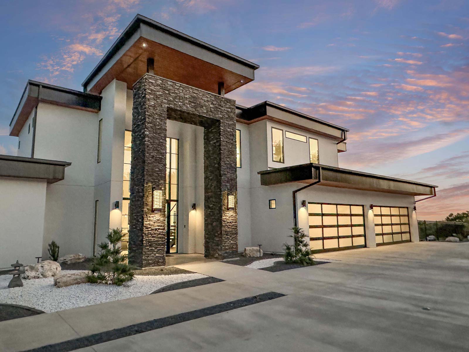 Sunset Ridge Villa minimalist stone and wood residence at sunset