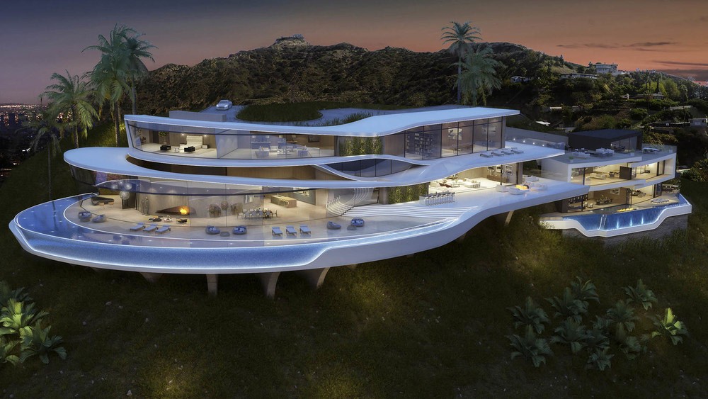 Twilight Glass Mansion built into a hillside with illuminated pools